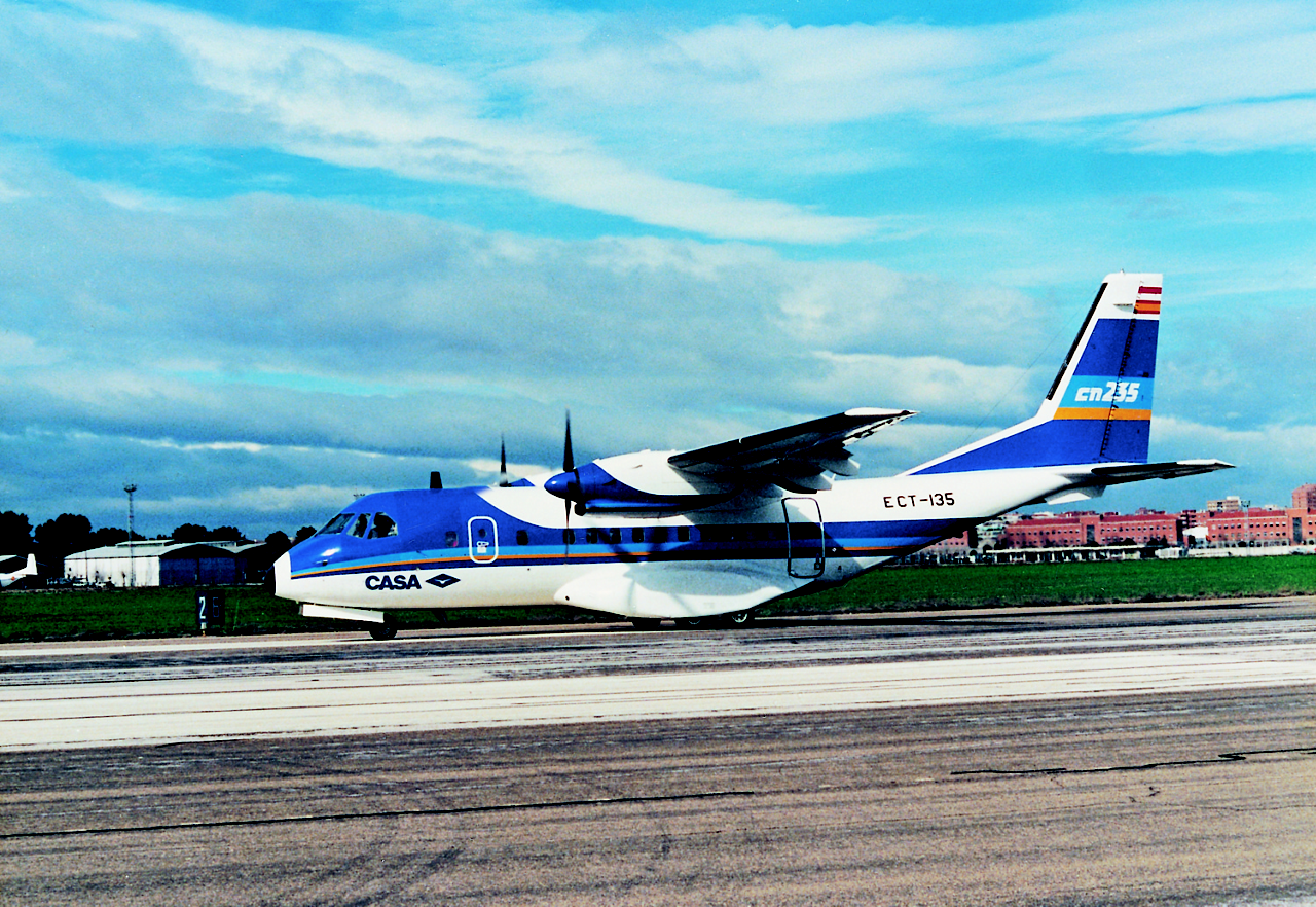 A CN235 airlifter speeds down the runway ahead of its 1983 maiden flight.  