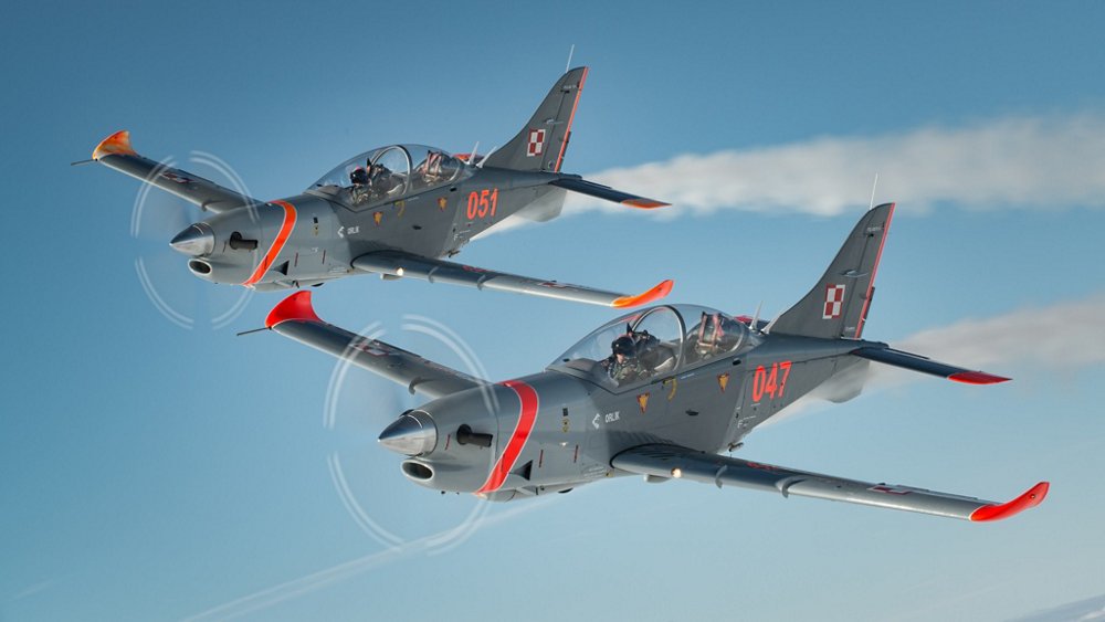 Two in-flight PZL-130 Orlik aircraft, which are manufactured at Airbus’ production facility in Warsaw, Poland. 