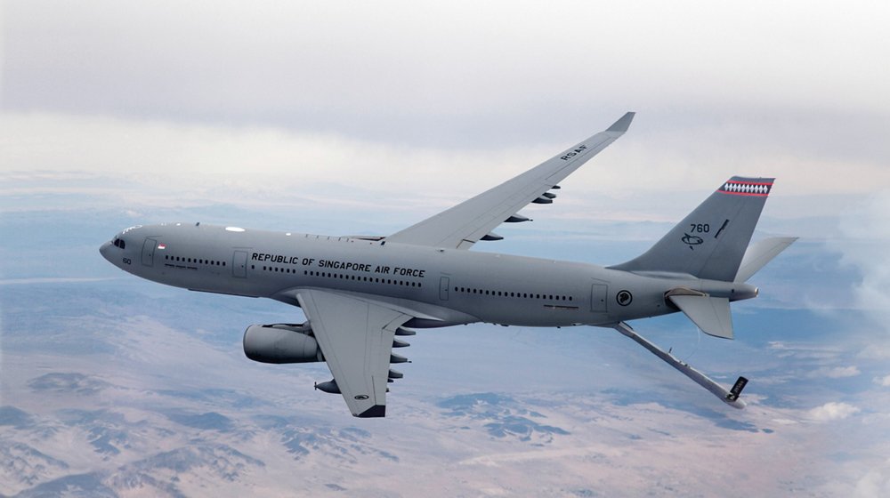 Side view of an in-flight A330 Multi Role Tanker Transport (MRTT) delivered to the Republic of Singapore Air Force. 