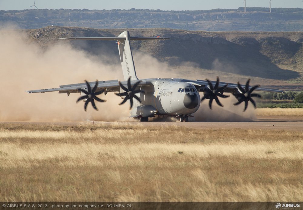 The A400M military airlifter lands on a short, unpaved airstrip.  