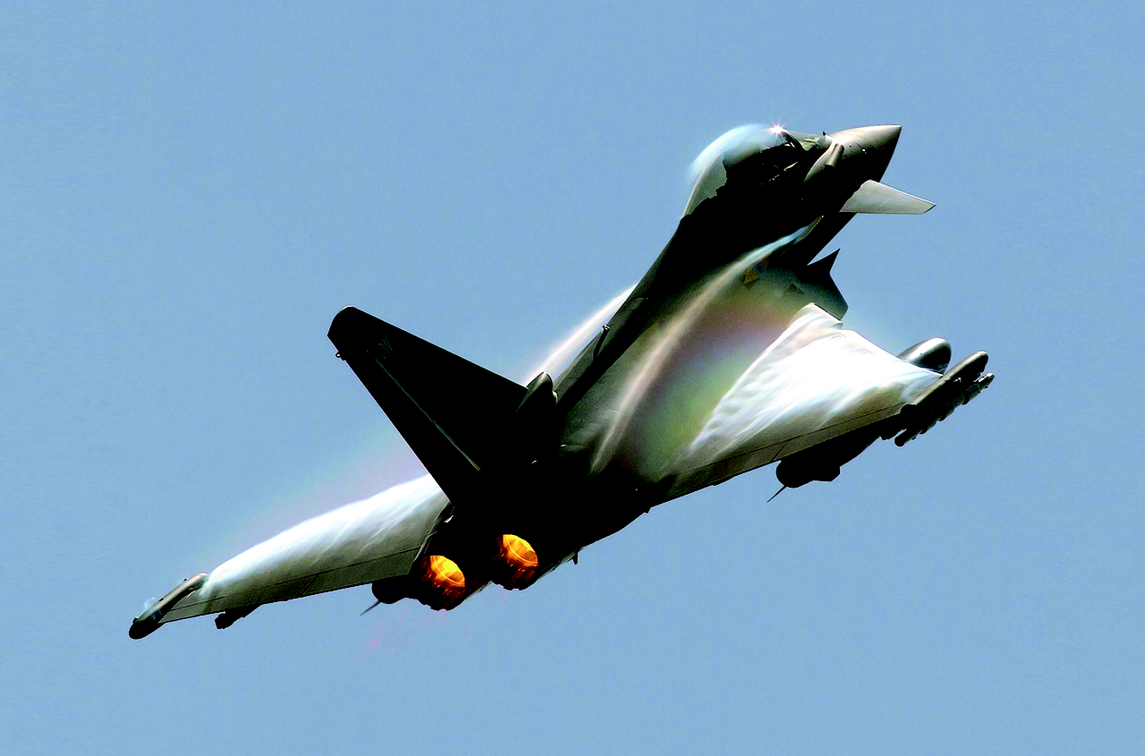 An in-flight Eurofighter Typhoon aircraft ascends.   