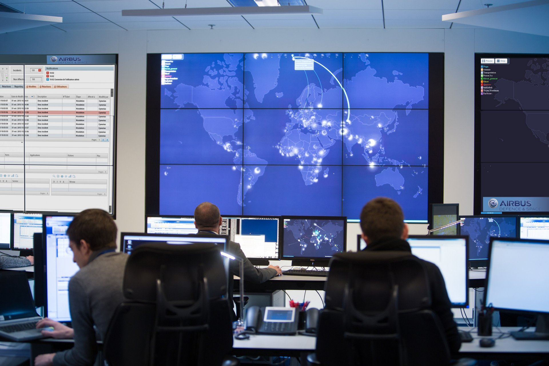 A view of personnel and systems in a border security command and control centre.  