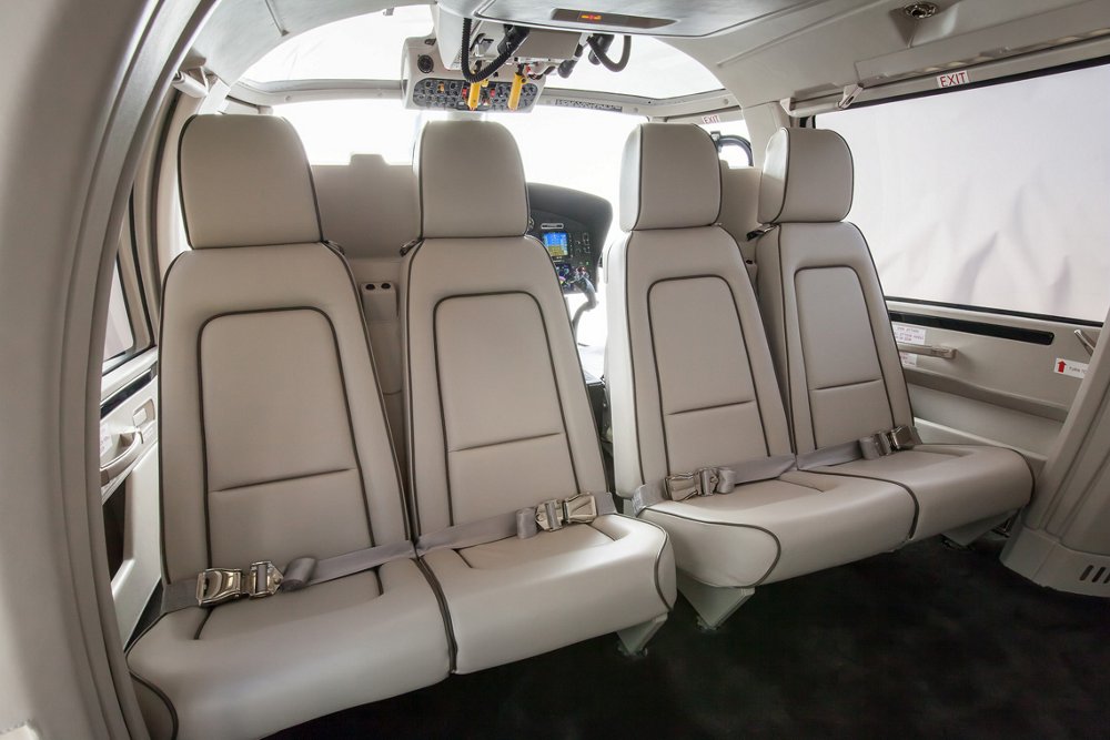 A row of passenger seats inside an Airbus AS365 N3+ helicopter  