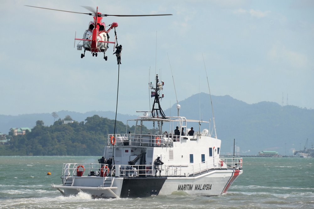 The hoist system is deployed by an Airbus AS365 N3+ helicopter configured for coast guard and enforcement operations. 