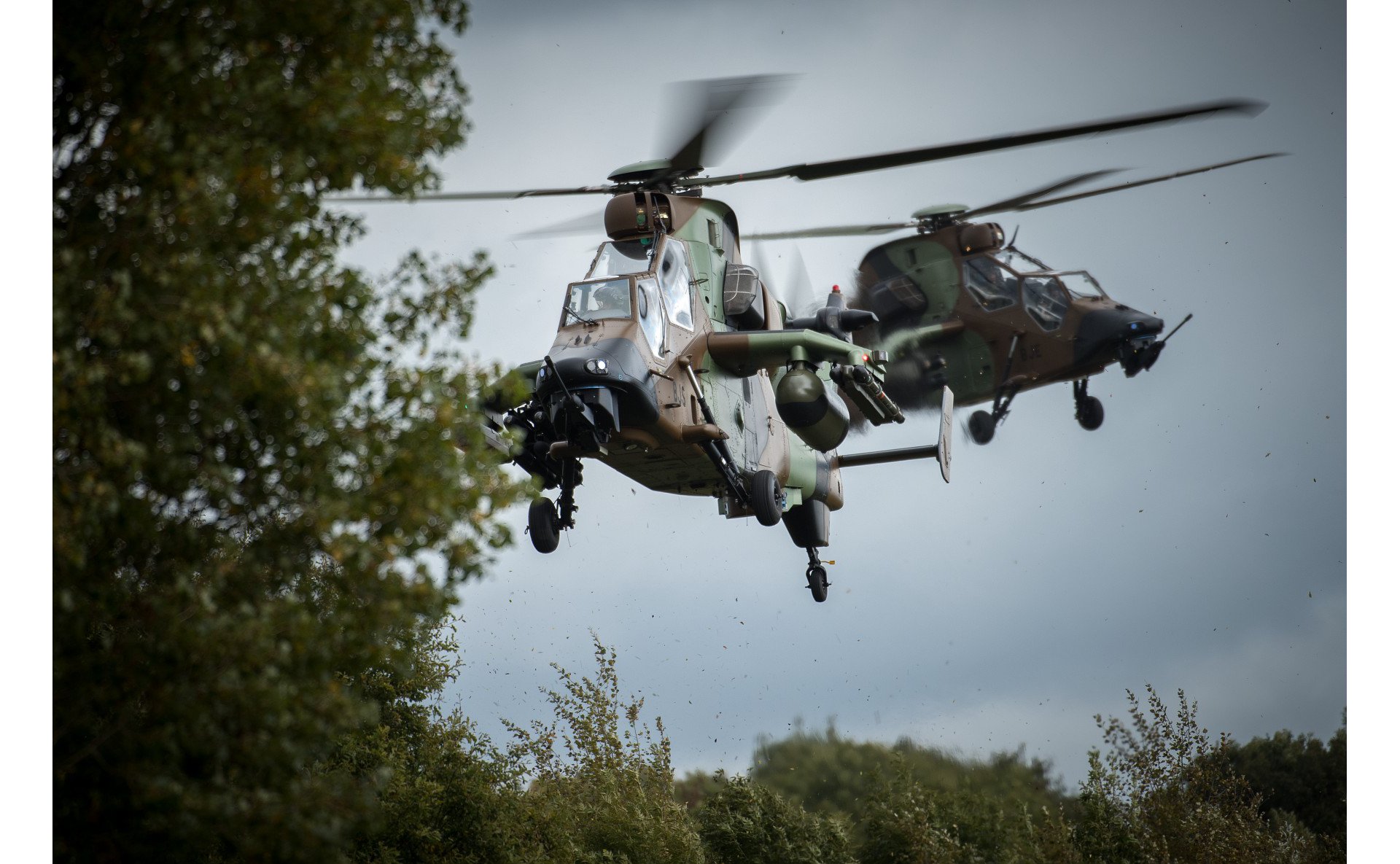 A view of two in-flight Tiger HAD military helicopters. 
