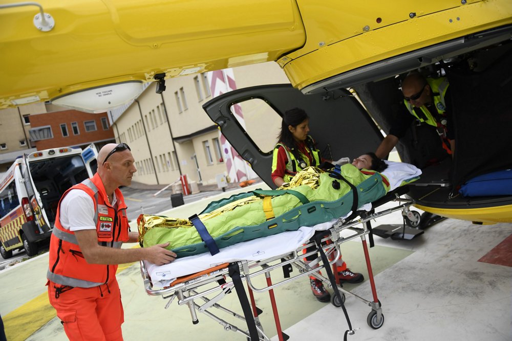 Operator Babcock loads a patient onto an H145