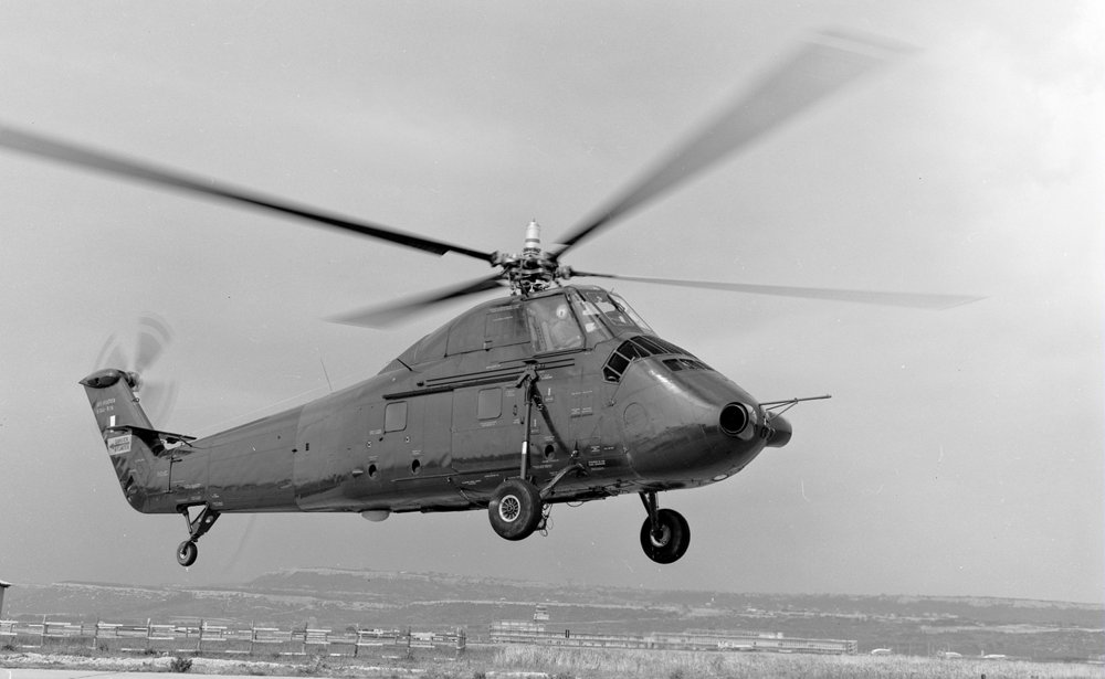 An in-flight photo of an H-34 BB helicopter in 1963.  
