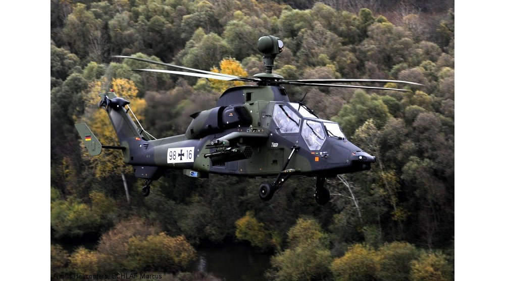 Side view of an in-flight Tiger HAD military helicopter delivered to the German Armed Forces. 