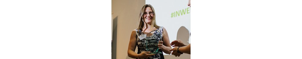 Airbus apprentice Catherine Llewellyn-Jones holding her award