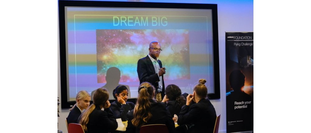 Kriss Akabusi at the launch of the Stevenage Flying Challenge speaking in front of students