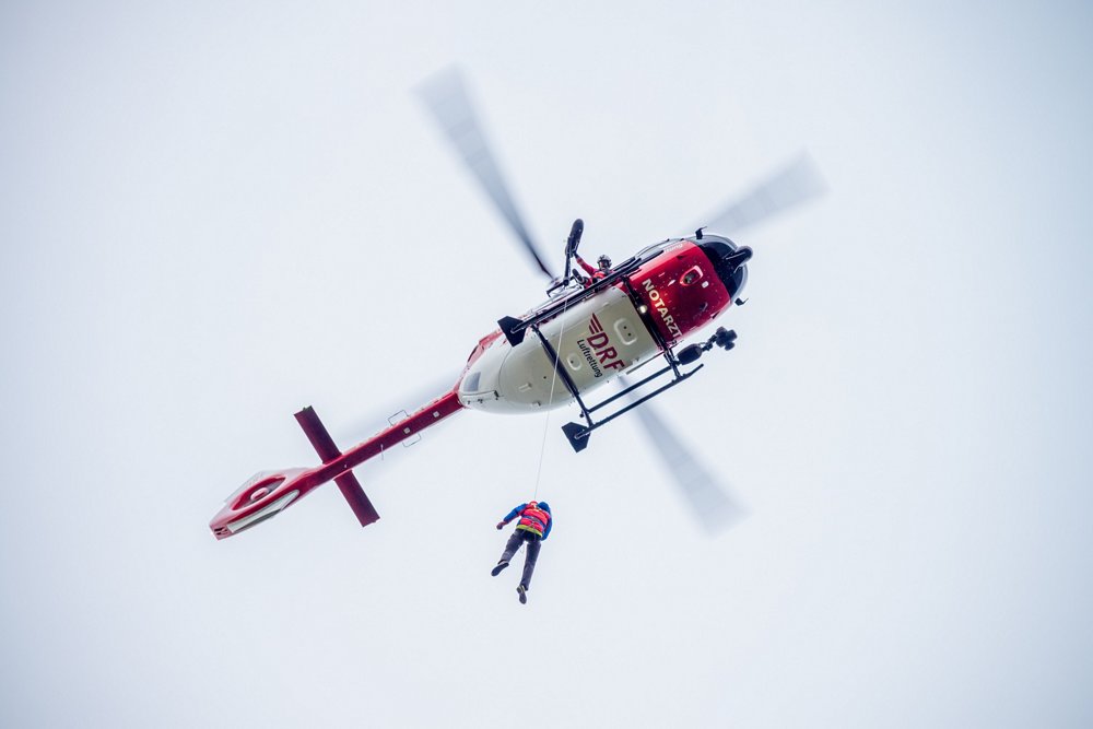 A DRF Luftrettung crew from the HEMS base in Bautzen performs rescue winch training with an Airbus-built H145 helicopter.