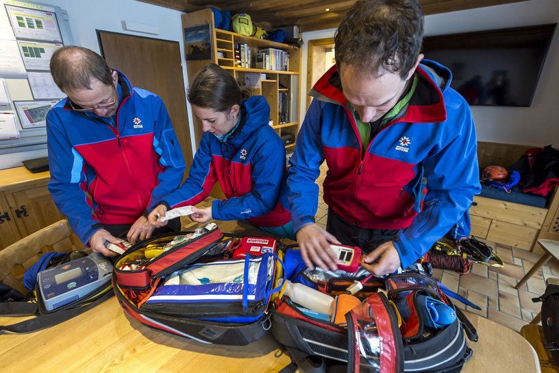 A rescue team gets ready to perform a rescue mission in the Bavarian Alps