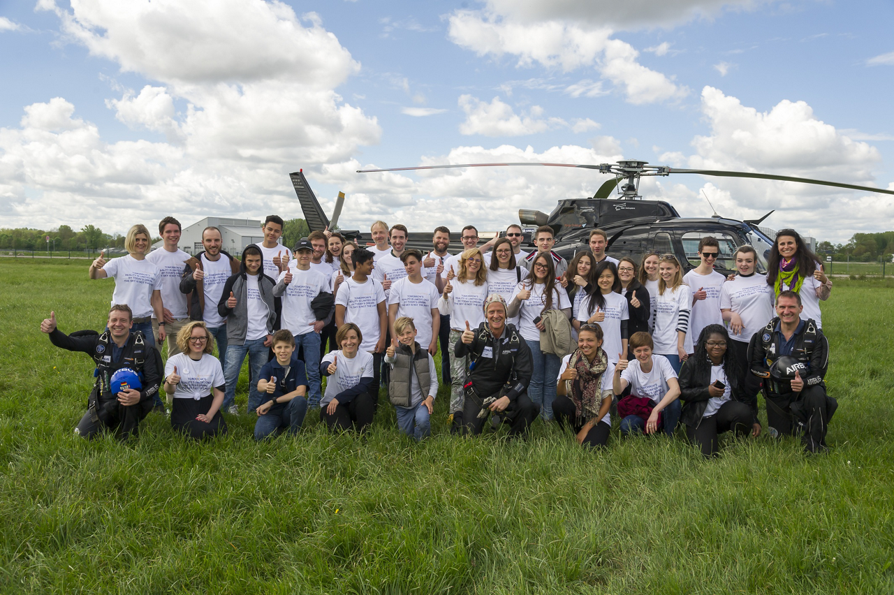 Participants at an Airbus Foundation Flying Challenge event in Germany mark the occasion with a group photo.