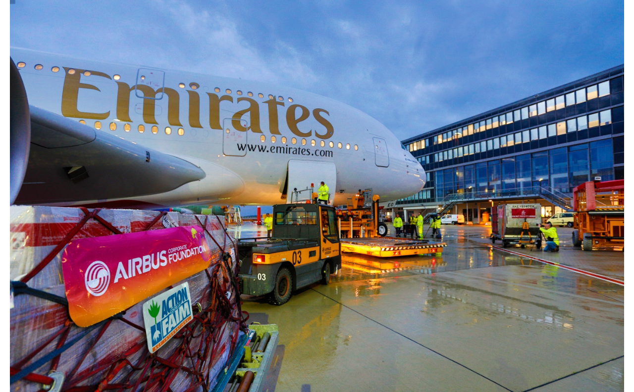 Medical and school supplies are transported on the ferry flight for an Airbus A380 delivered to Emirates. 