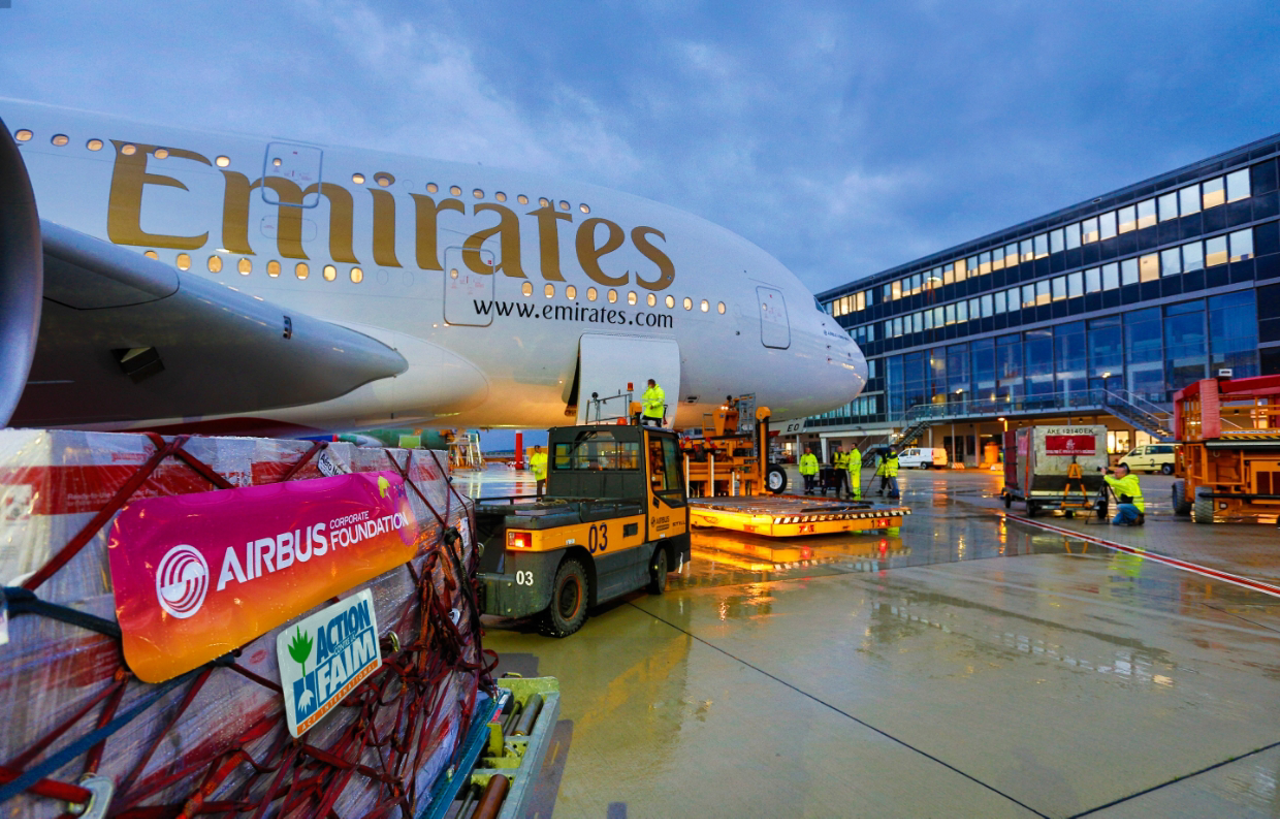 Medical and school supplies are transported on the ferry flight for an Airbus A380 delivered to Emirates.