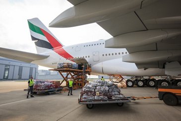 Emergency shelter items are loaded on board of an Emirates A380 flying from Hamburg to Dubai