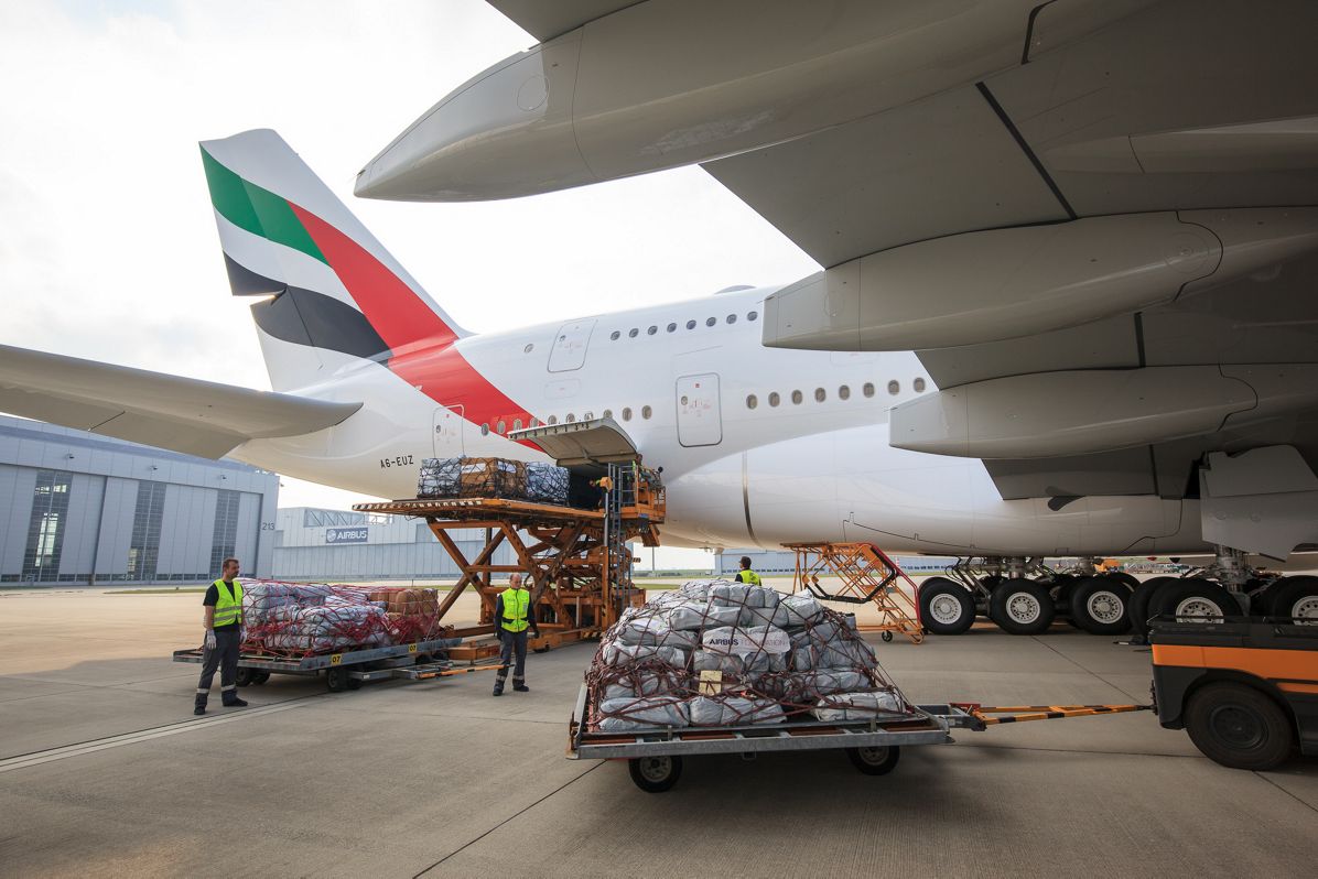 Emergency shelter items are loaded on board of an Emirates A380 flying from Hamburg to Dubai
