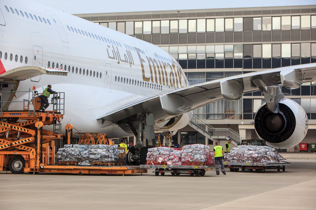 Emergency shelter items are loaded on board of an Emirates A380 flying from Hamburg to Dubai