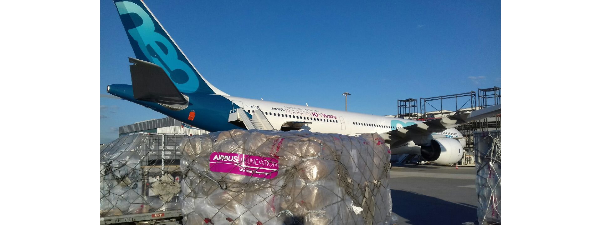 Loading of relief goods for victims of cyclone Idai on an Airbus A330neo test aircraft at Geneva Airport, Switzerland.