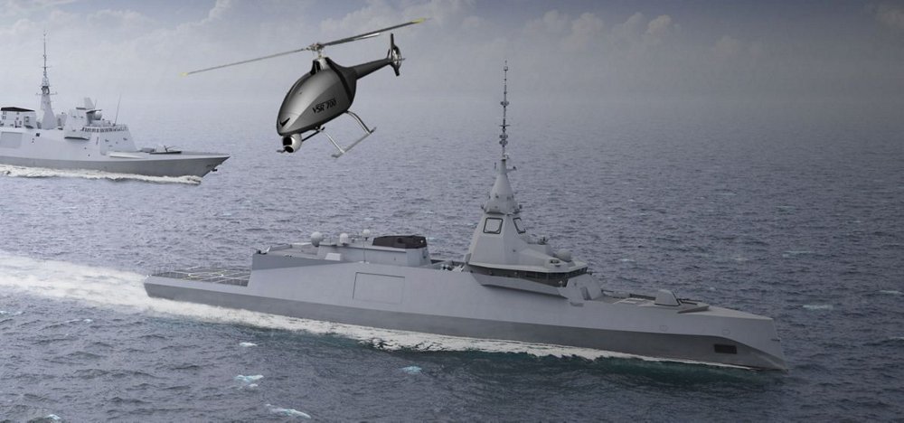 A computer rendering of Airbus’ VSR700 multi-mission unmanned aerial system flying over the ocean with two ships.  