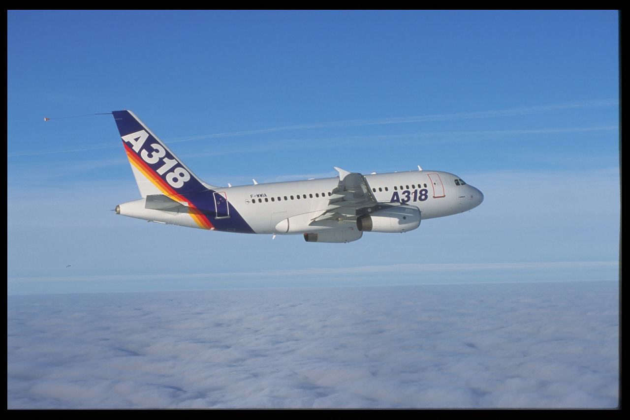 A side view of the Airbus A318 commercial aircraft during its 2002 maiden flight.