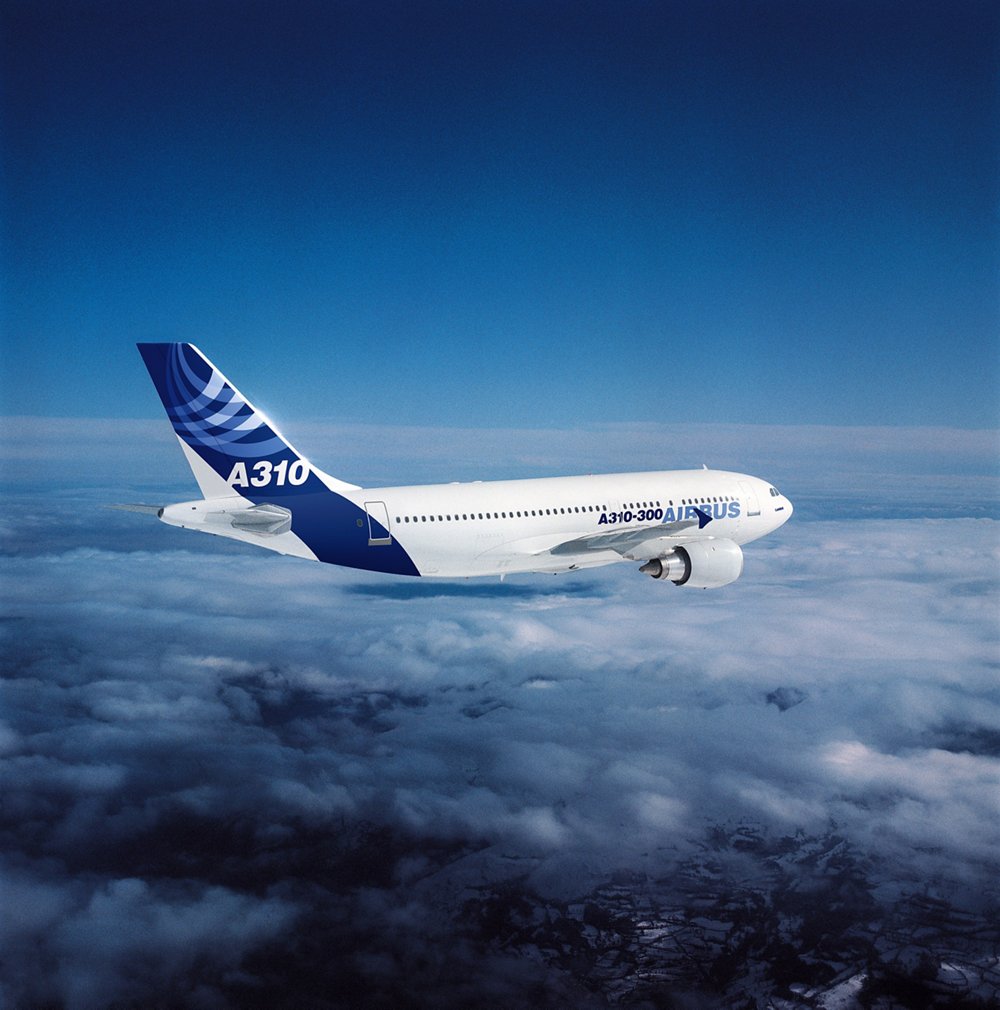 Side view of an Airbus A310 in flight  