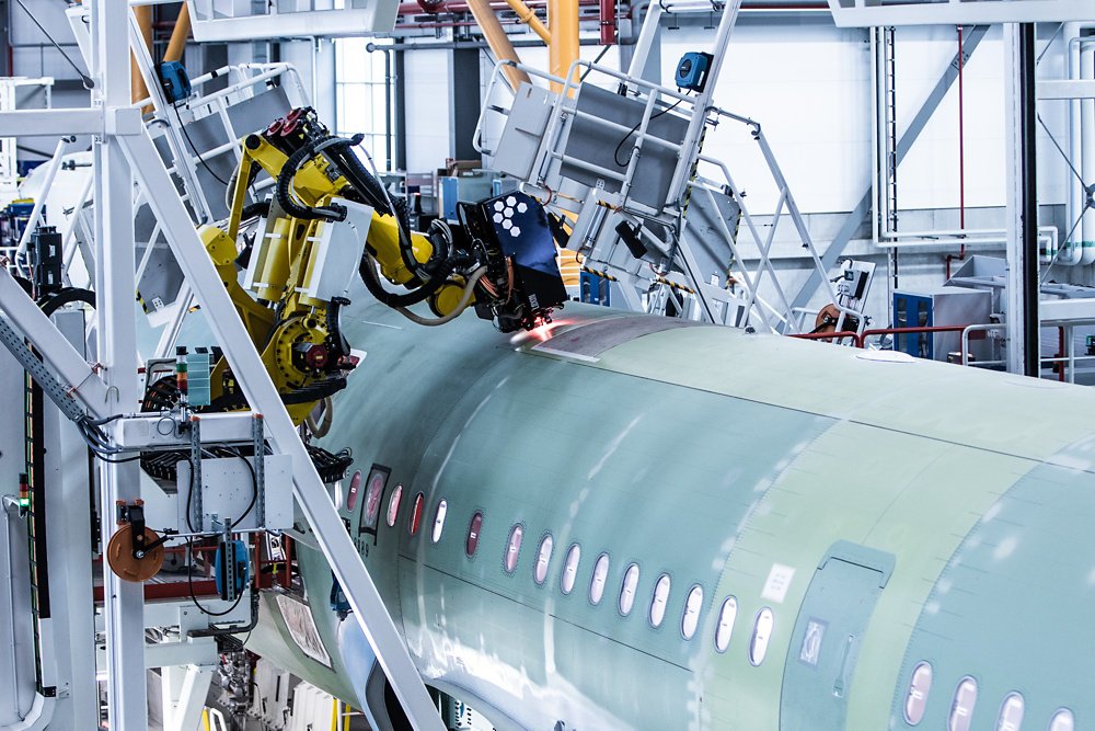 A seven-axis robotic arm performs precise fuselage drilling at Airbus’ newest A320 Family production line in Hamburg, Germany, which was inaugurated in June 2018.  