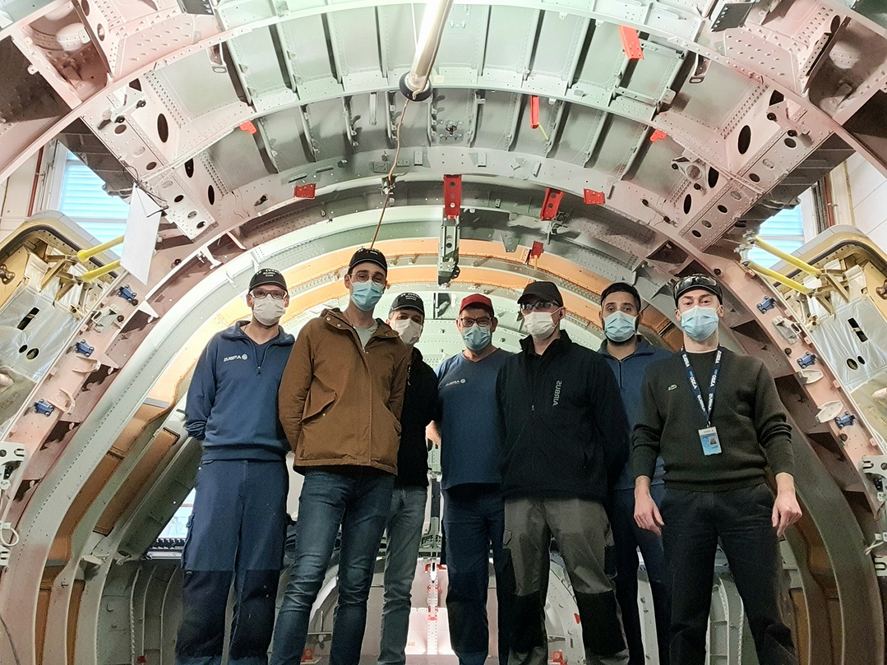 Team members earlier this year in St Nazaire installed the Physical Mock-Up (PMU) to represent the Nose & Forward (NFF) section of the A321XLR.