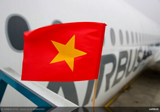 Hanoi's flag (Vietnam) in front of A350-1000 Airbus on ground