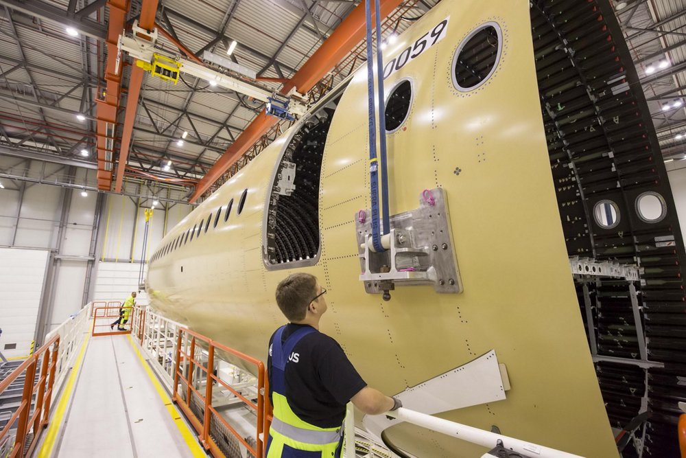 An A350-1000 aircraft’s forward fuselage section is shown at Airbus’ Hamburg, Germany industrial site. 