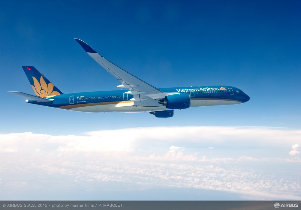 Side view of an in-flight A350 XWB in the colours of Vietnam Airlines. 