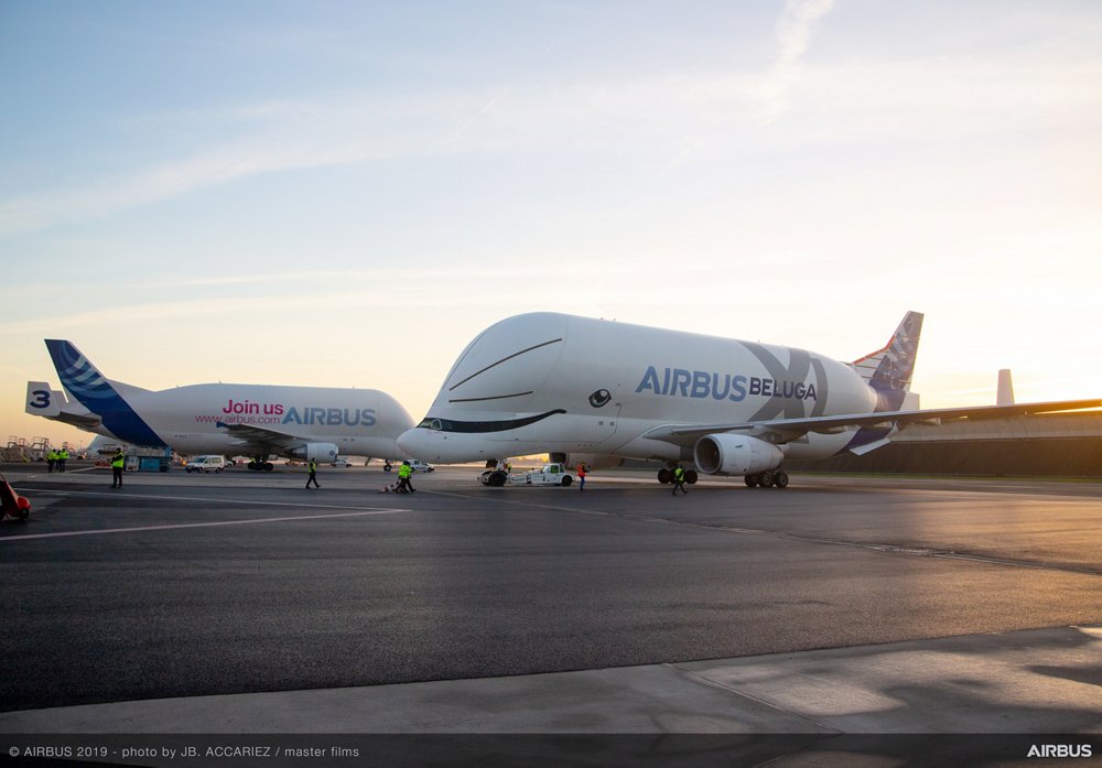 The two generations of Airbus airlifters are shown together: the BelugaXL and Beluga ST 
