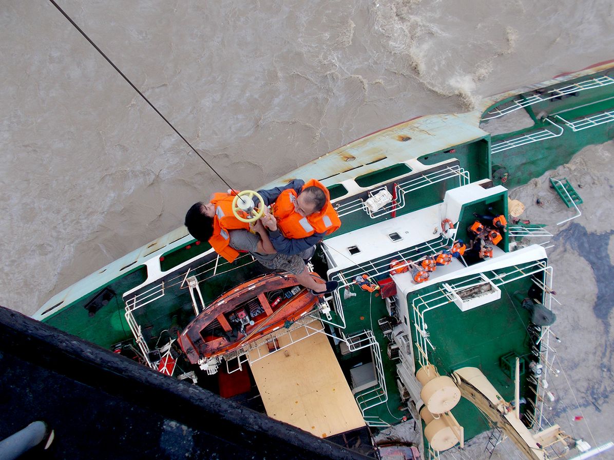 Hong Kong Government Flying Service performs rescue mission during Typhoon Hato 2