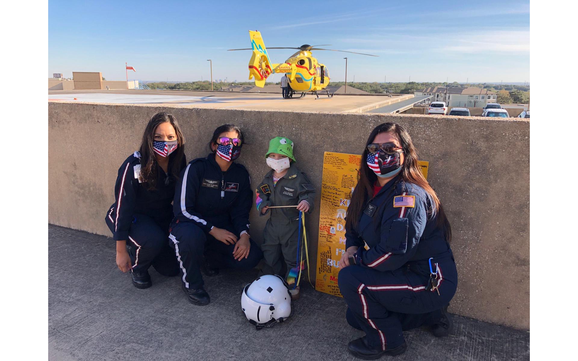 Crew members from Methodist AirCare welcomed their new honorary teammate Bodhi with a flight aboard the operator’s EC135 helicopter, visible in the background
