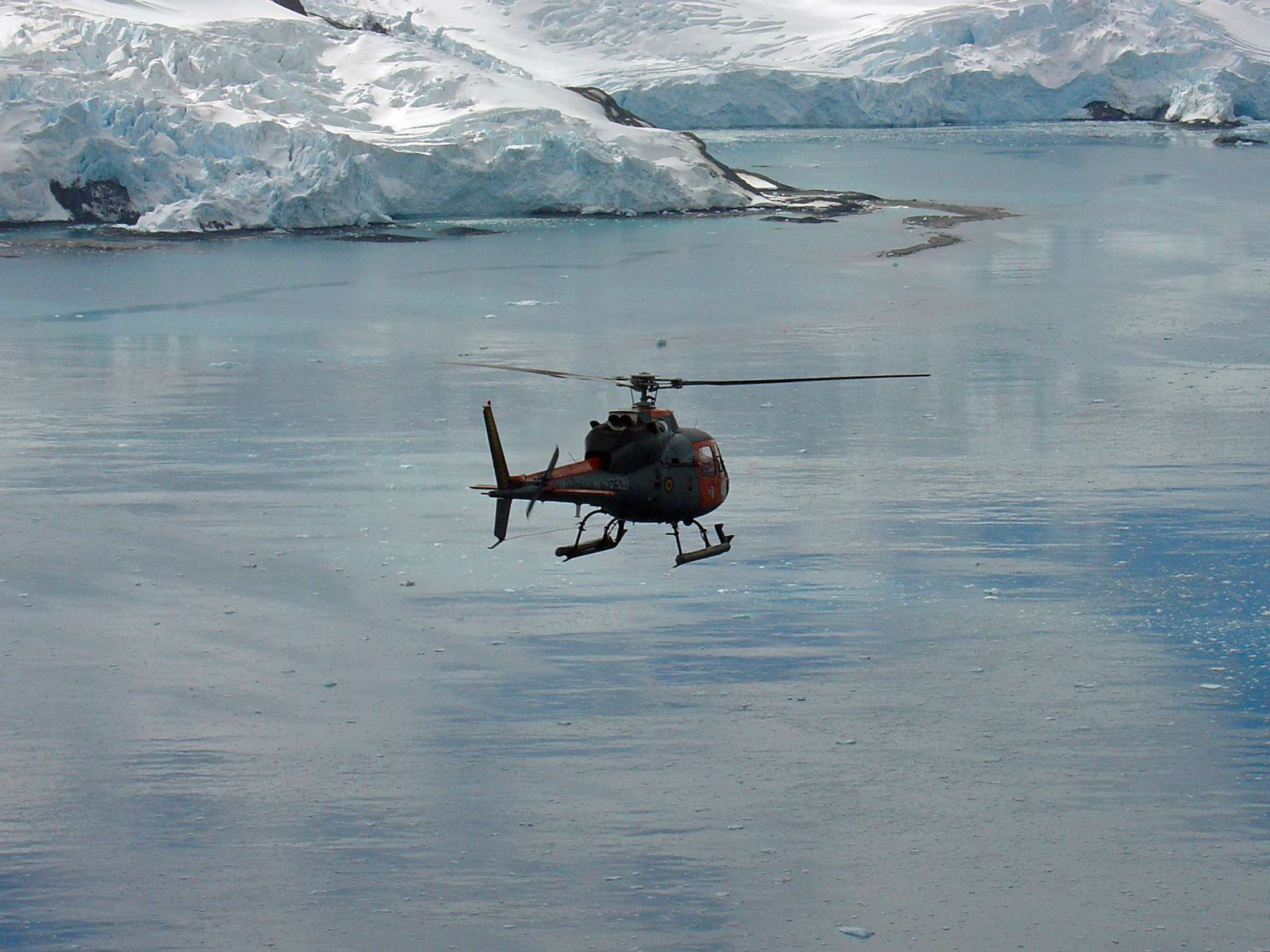 Image of H125 flying above Arctic sea