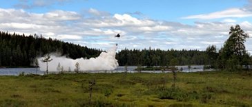 Scandair H125 helicopter sprays lime