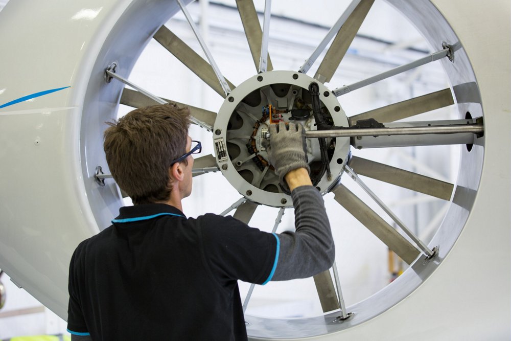 Maintenance is performed on a helicopter’s shrouded Fenestron tail rotor.