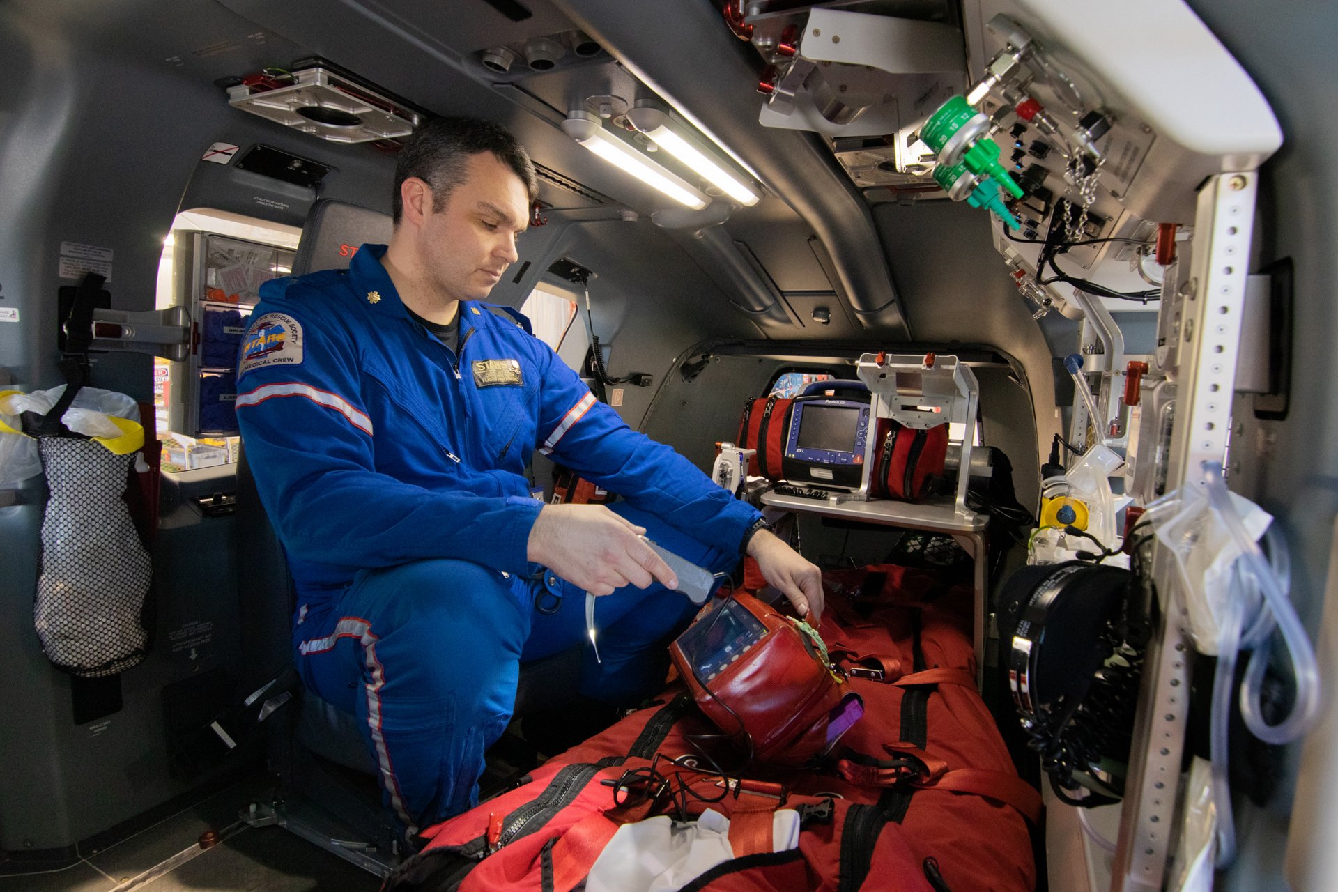 Greg Barton, flight paramedic at work in STARS' H145.