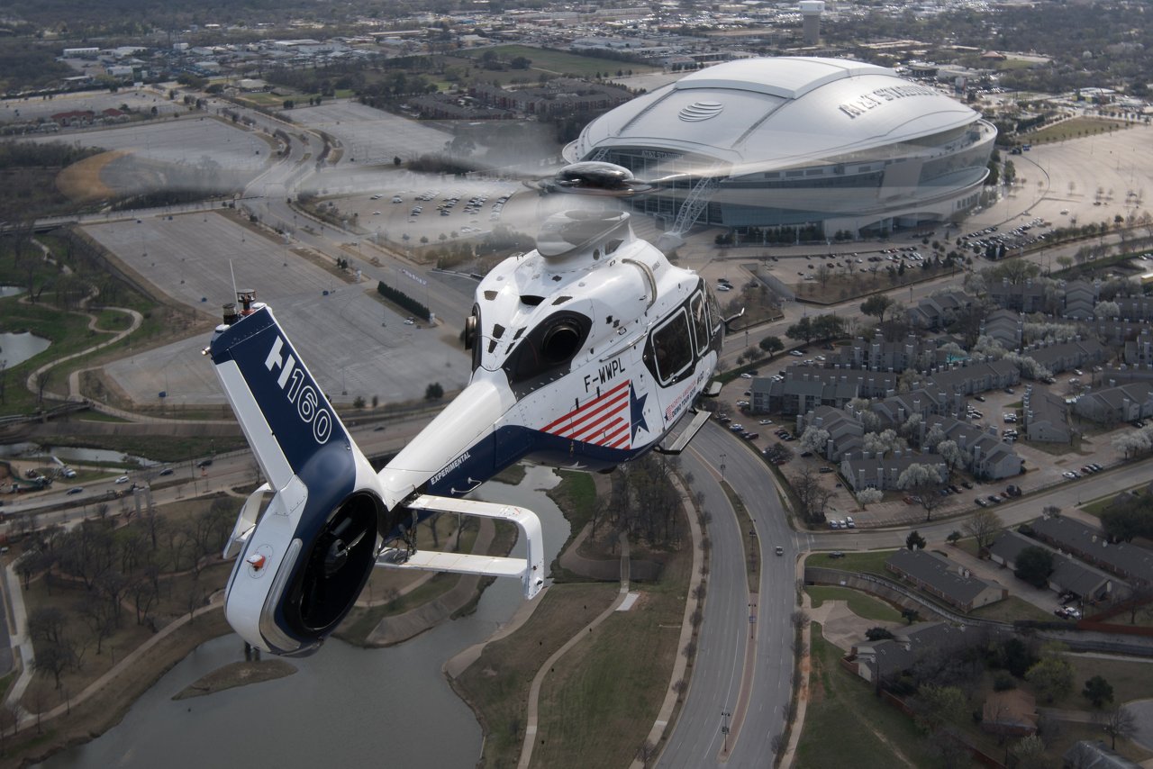 The Airbus H160 prototype flies toward AT&T Stadium, home of the National Football League’s Dallas Cowboys, while on a demonstration tour across North America