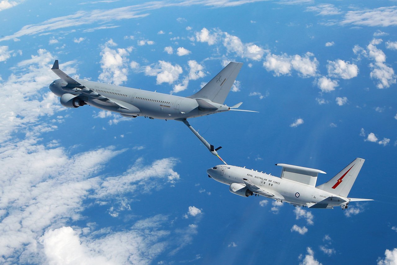 KC-30A MRTT and E-7A Wedgetail conduct Air to Air refuelling testing in the airspace near RAAF Williamtown. *** Local Caption *** Air-to-air refuelling trials between KC-30A Multi-Role Tanker Transport and E-7A Wedgetail
From 1-13 June 2015, air-to-air refuelling (AAR) trials were conducted between a RAAF KC-30A Multi-Role Tanker Transport (MRTT) and an E-7A Wedgetail Airborne Early Warning and Control (AEW&C) aircraft for the first time. The KC-30A utilised its 17-metre-long Aerial Refuelling Boom System, which is capable of offloading fuel at up to 4500 litres per minute. During the trials, a total of seven sorties were flown by each aircraft, during which they conducted 118 'dry' contacts with the KC-30A's refuelling boom, and six 'wet' contacts, with a 20 tonnes of fuel being transferred. The trials were conducted under the direction of the Aircraft Research and Development Unit (ARDU), and will allow a significant increase in mission range and endurance for the Wedgetail. 
