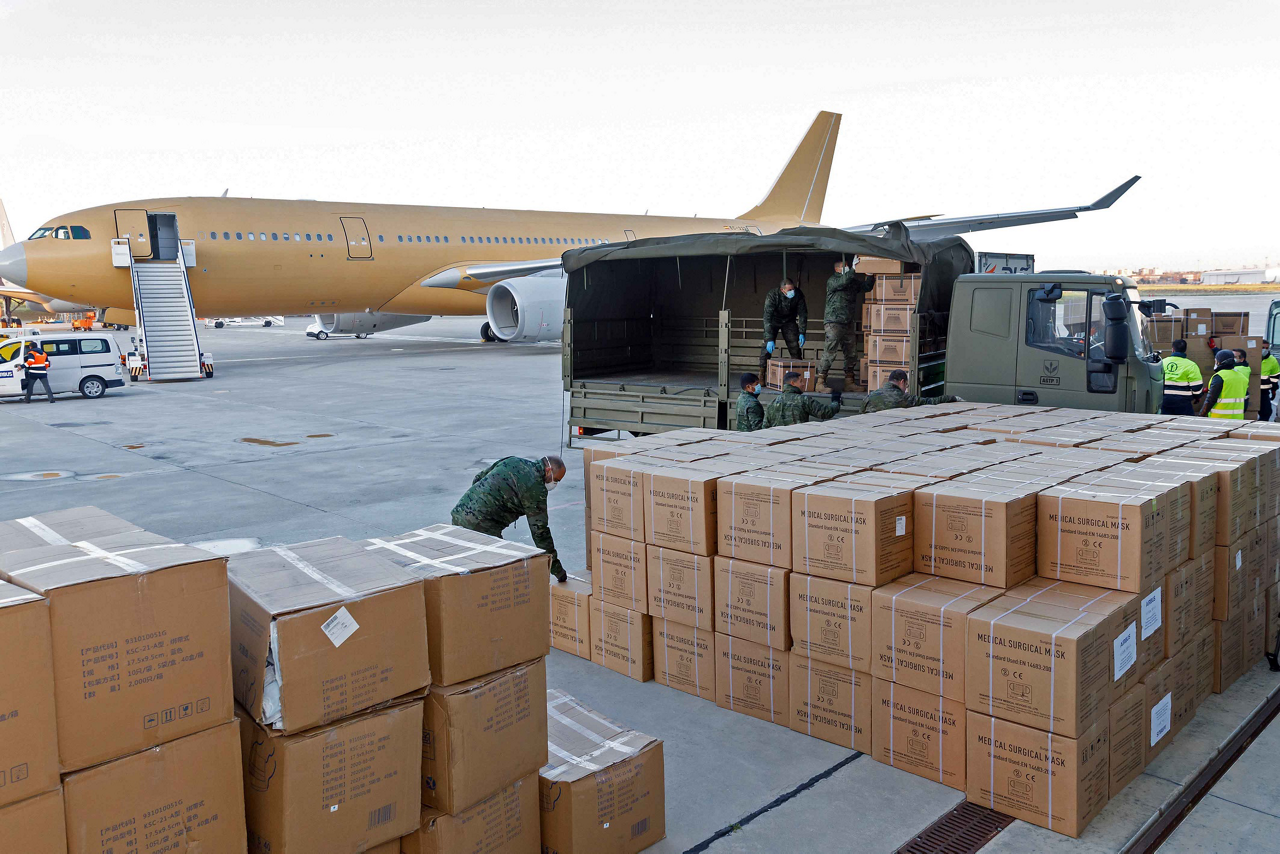 Boxes of protective face masks and other medical supplies are unloaded from an A330-200 after completing a March 2020 supply flight from Tianjin, China – which was operated by a crew from the military aircraft operation of Airbus Defence and Space in Spain