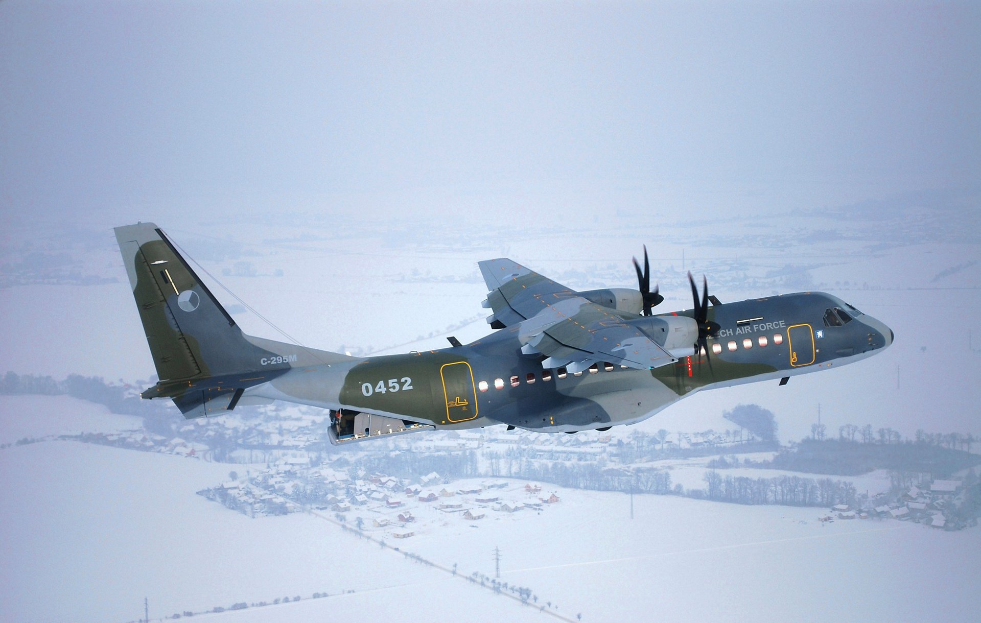 Czech Air Force's Airbus C295 medium airlifter in flight. The aircraft is equipped with winglets in transport configuration.