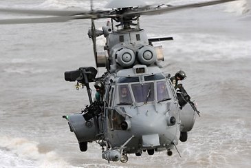 H225M Caracal flying over the sea