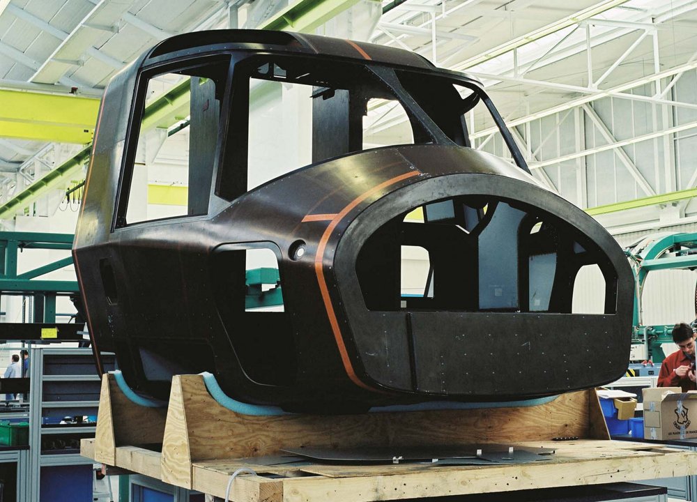 A photo of the front fuselage section for an in-production NH90 helicopter.  