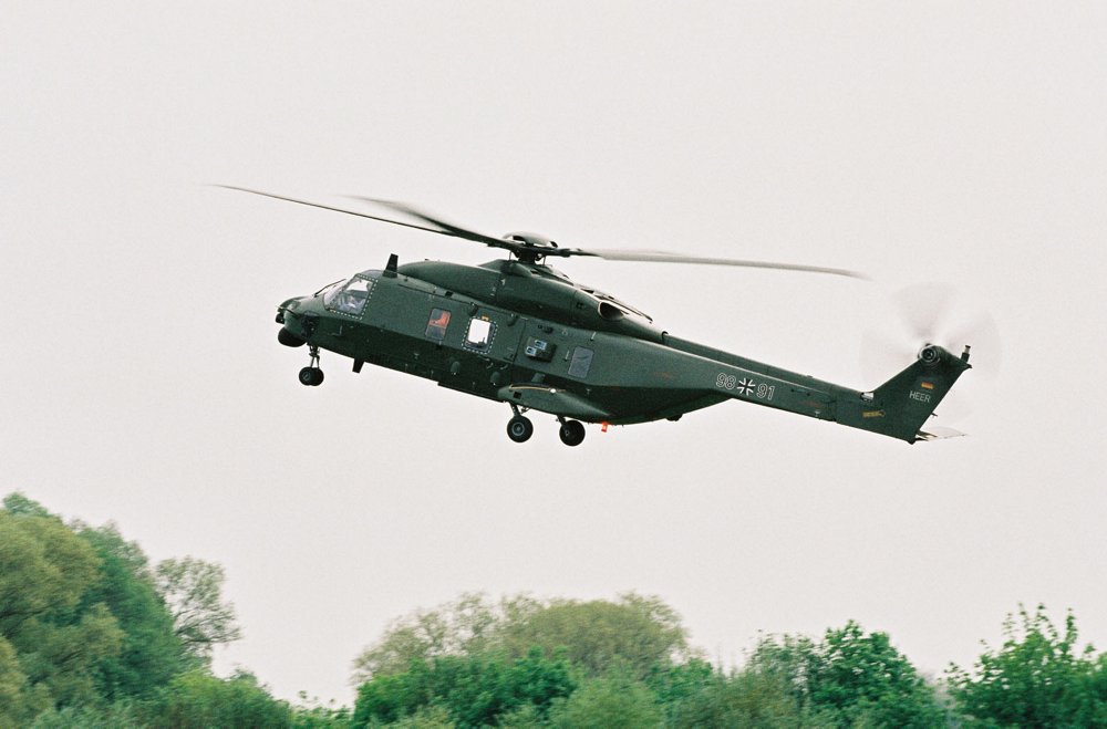 The side view of an in-flight TTH German army variant of the Airbus-produced NH90 helicopter.  