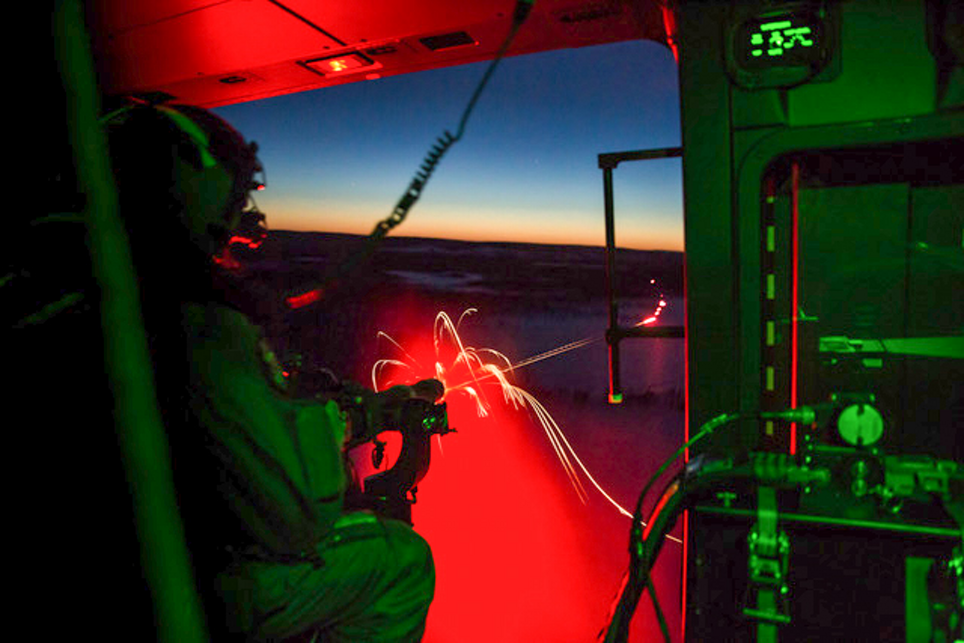 Inside view of Finnish Defence Forces NH90 during live firing exercise.