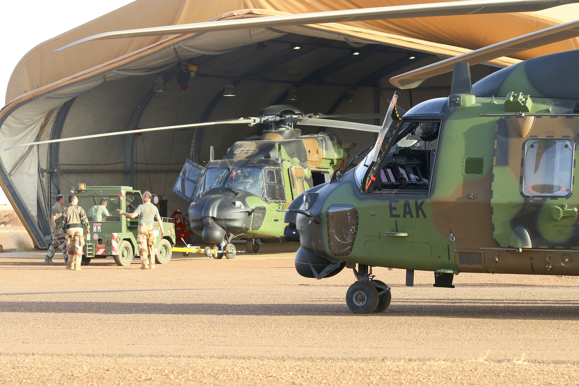 An NH90 helicopter is shown in the Sahel area.