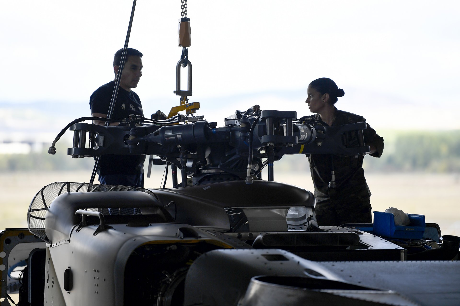 Maintenance is performance on an NH90 military helicopter’s main rotor. 