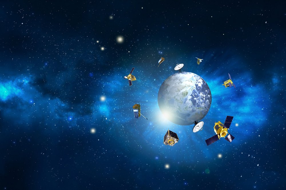 An artist’s representation of multiple Airbus-built Earth observation satellites orbiting the planet.  